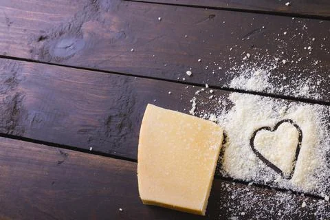 High angle view of cheese with heart shape on wooden table, copy space Stock Photos