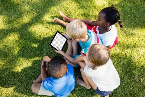 High angle view of children looking in digital tablet Stock Illustration