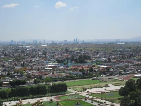 High Angle View of Cholula Suburbs with Puebla Skyline in Distance, Mexico Stock Photos