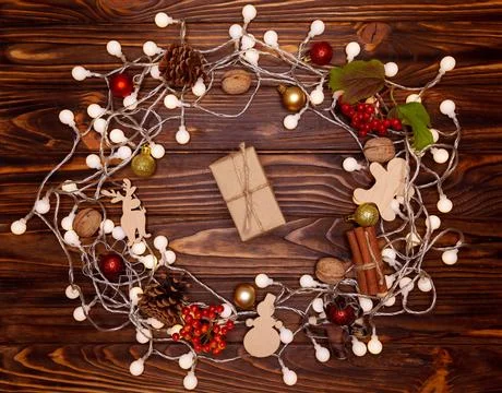 High angle view of Christmas present wrapped in craft paper. Fotos Stock