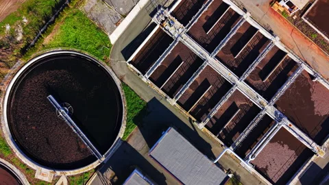 High angle view of circular clarifier and aeration basins Stock Footage 327932672