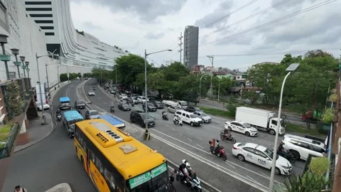 High angle view of city bus and street traffic in Taguig City 4K Stock Footage 337950912