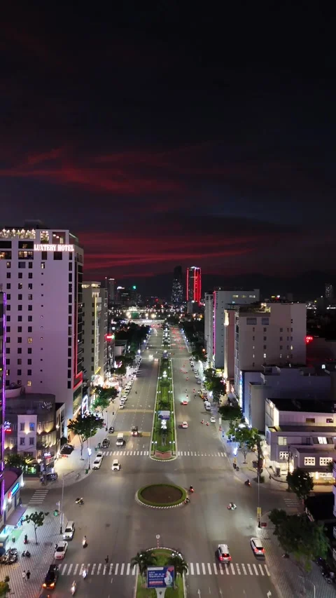 High Angle View of City Traffic Flowing at Night in Da Nang, Vietnam Stock Footage 335846790