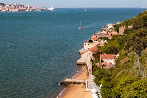 High angle view of cliff with abandoned warehouses contrasting with modern an Stock Photos