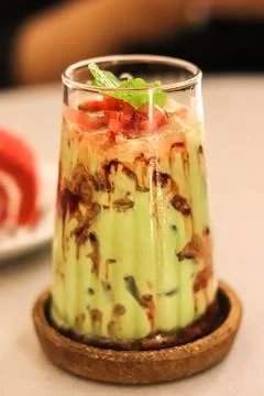 High-angle view of close-up of Juice with avocado on table Stock Photos