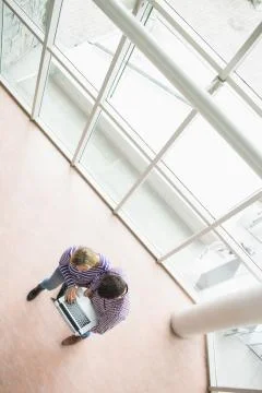 High angle view of college students using laptop 스톡 사진