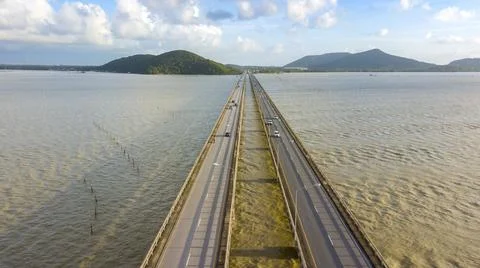 High angle view of concrete bridge across the sea Stock Photos