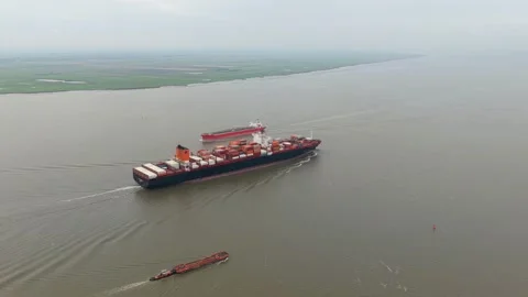 High angle view of container ship on scenic Elbe waterway in Germany Stock Footage 320246145