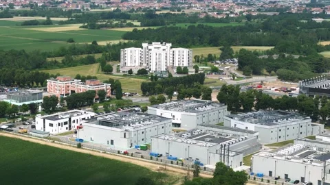 High-angle view of a contemporary industrial zone featuring warehouses and Видео 336631442