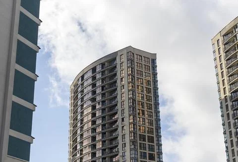 High angle view of a contemporary multi story curved residential building. Ci Stock Photos