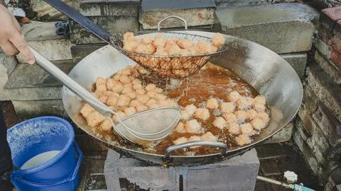 High angle view. The cooking process of Crispy Pong Tofu in deep frying hot pan Stock Photos
