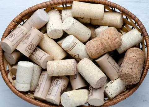 High angle view of cork stoppers   in a wood  basket. Stock Photos