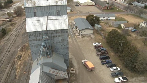 High angle view of corn mill with town in background Vidéo 104432355