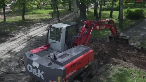 High angle view, crane shot, dredger loading with ground tipper truck. Stock-Footage 76642753