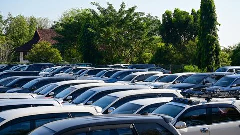 High Angle View of Crowded Outdoor Parking Lot Filled with Rows of Cars 스톡 사진