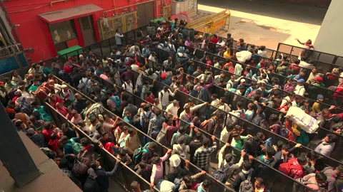 High Angle View of Crowded Passenger Queue at Indian Railway Station Stock Footage 335365951
