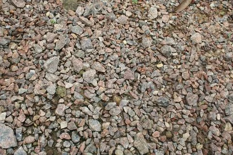 High angle view of crushed granite gravel stones texture. 스톡 사진