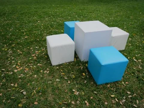 High Angle View of Cubed White and Cyan Table and Seats at the Park Stock Photos