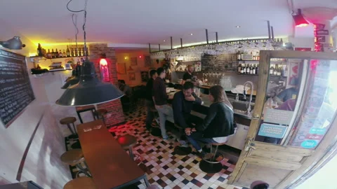 High Angle View of Customers at Cozy European Beer Bar Counter Vídeo Stock 344953454