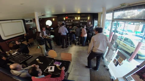 High Angle View of Customers Socializing Inside Busy Paris Beer Bar Vídeo Stock 344954386