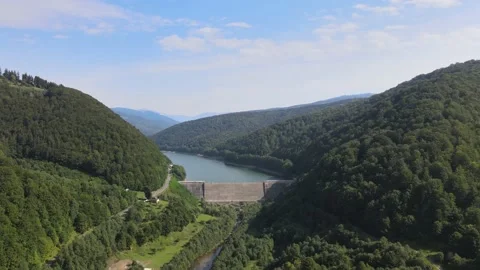 High angle view of the dam against the mountains view from the drone 4k Stock Footage 138863495