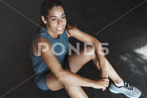 High-angle view determined fitness instructor, sportswoman contemplate window Stock Photos