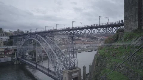 High angle view of the Dom Luis I Bridge upper deck with pedestrians. Stock Footage 327624449