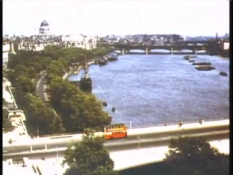 High angle view of double decker bus traveling across bridge in London, 1950s Stock-Footage 64630058