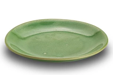 High angle view of empty green shallow ceramic plate. Stock Photos