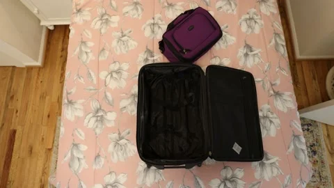 High Angle View Of Empty Suitcase On Bed Slowly Pushing In Stock-Footage 233456827