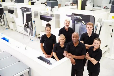 High Angle View Of Engineering Workshop With CNC Machines Stock Photos