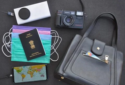 High angle view of essential items for international traveling during Covid19  Stock Photos