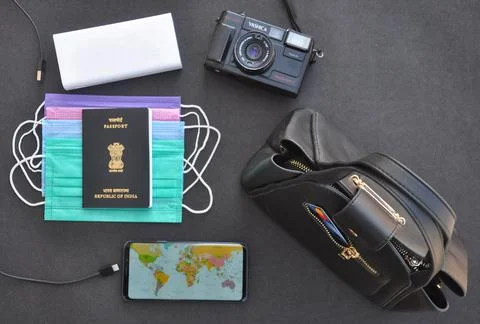 High angle view of essential items for international traveling during Covid19  Stock Photos