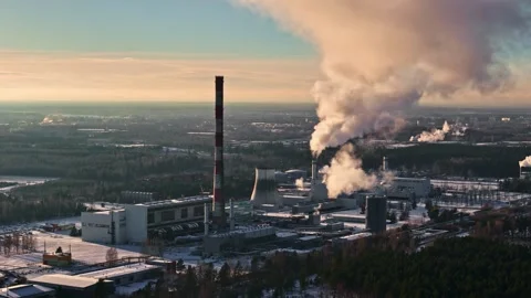 High angle view factory emissions and cooling tower in winter landscape Stock Footage 337211950