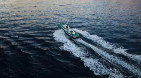 High Angle of View of a fast boat in the middle of the Ocean Stock Footage 39465939