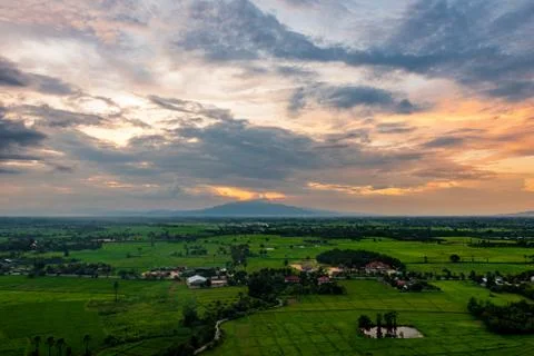 High angle view of fields and villages at sunset. Stock-Fotos