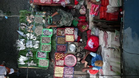 High angle view of fish seller working at the fish market. Stock Footage 274640544