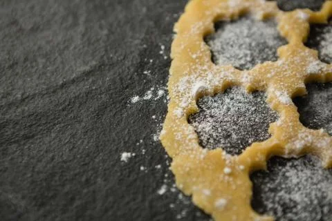 High angle view of flower shape on dough Fotos de archivo