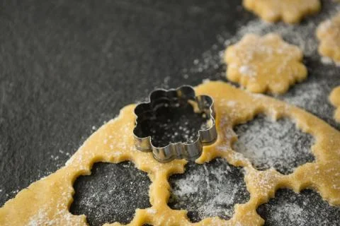 High angle view of flower shape mould on dough Fotos de archivo