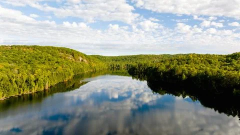 High angle view of a forest and lake Stock-Fotos