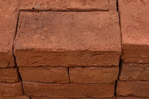 High angle view of a fresh brick stacked on a pile of bricks for sale 스톡 사진