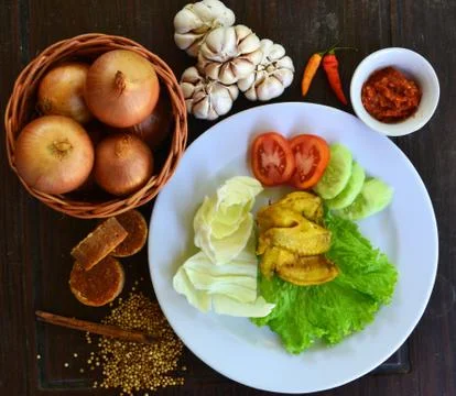 High Angle View Of Fried Chicken Served On A Plate With Vegetables Stock Photos