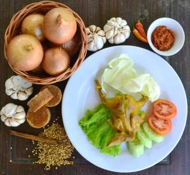 High Angle View Of Fried Quail Is Served On A Plate With Vegetables Stock Photos