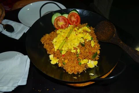 High angle view of fried rice in a frying pan on the table Stock Photos