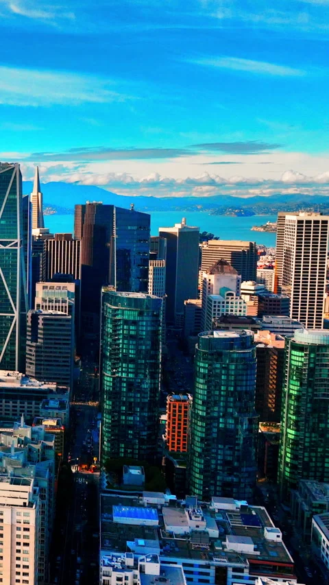 High angle view of glass towers and bay waters Vertical video. Stock Footage 331320227