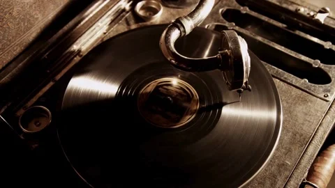 High angle view gramophone spinning black vinyl record disc Stock Footage 329595985