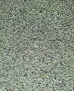 High angle view of green rubber crumb safety flooring for playgrounds and s.. Stock-Fotos