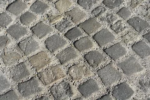 High angle view of a grey cobblestone pavement pattern Stock Photos