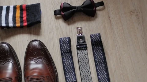 High angle view of groom's kit preparing for his wedding. He's excited and can't Stock Footage 89560265