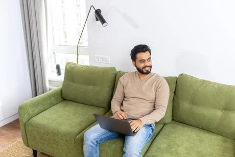 High angle view of the happy smiling business man distantly working from home Stock Photos